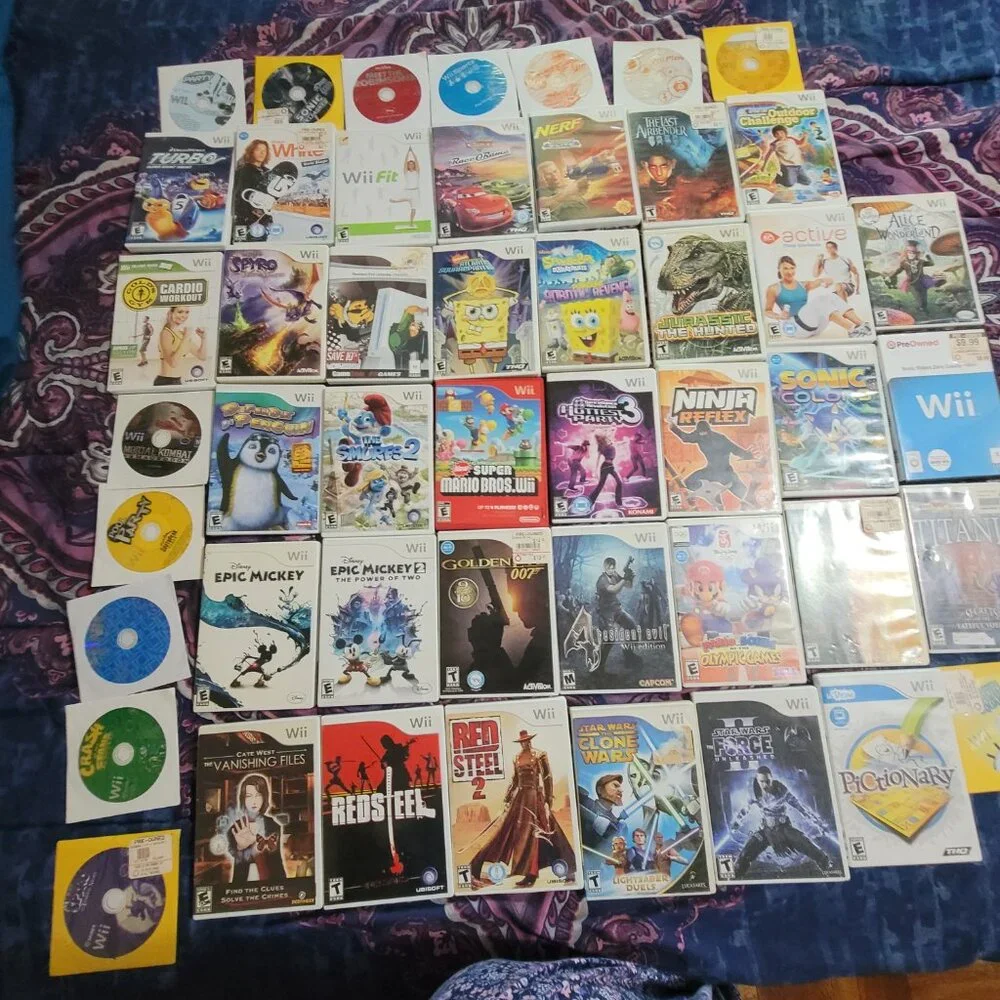 Nitendo Wii Black Console , Accessories with 48 Games included